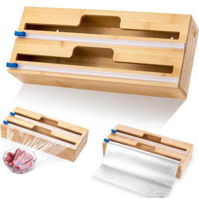 China Kitchen Drawer 2 In 1 Bamboo Plastic Wrap Dispenser With Cutter for sale