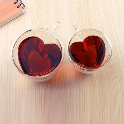 Китай Прозрачное стеклянное сердце подарка выпивая чашек таможни ISO9001 сформировало 200ml-300ml продается