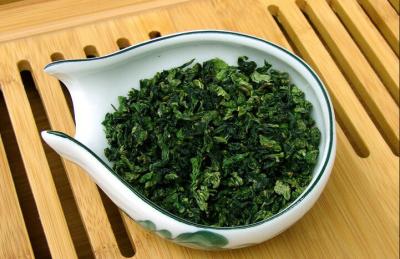 China Fujian Brown Crystal Organic Oolong Tea Iron Goddess Tea Leaves for sale