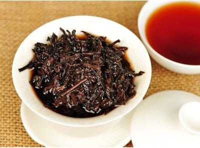 中国 茶色がかった金褐色の色の反炎症性のポストによって発酵させるSheng Pu Erhの茶 販売のため