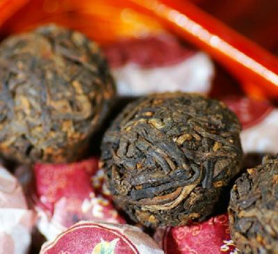 China Organic Pu Erh Mini Tuo Cha , Cooked Yunnan Puer Tea Cake With Powerful Flavor for sale