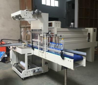 China Full Automatic Beverage Plastic Bottle And Mineral Water Sleeve Wrapping And Shrink Packing Machine / Shrink Wrapping Machine for sale
