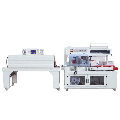 China Food Sealing And Slitting Machine With Film Heat Tunnel Shrink Wrapping Wrapping Machine For Shoebox Book Package for sale