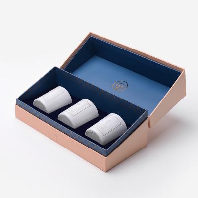 China 3 juegos de cajas de embalaje de velas de lujo, oro de regalo, estampado en caliente de 2 mm de espesor en venta