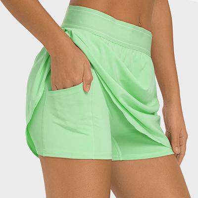 China Women's Athletic Golf Tennis Skorts Skirts with Pockets Built-in Shorts à venda