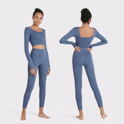 China High Waist Yoga Workout Clothes Breathable Yoga Leggings Top Set With Thumb Hole for sale