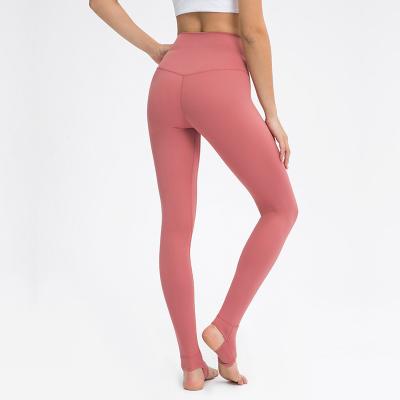 China Solid Color Sports Capri Pants Slim Fit High Waisted Yoga Leggings With Pockets for sale