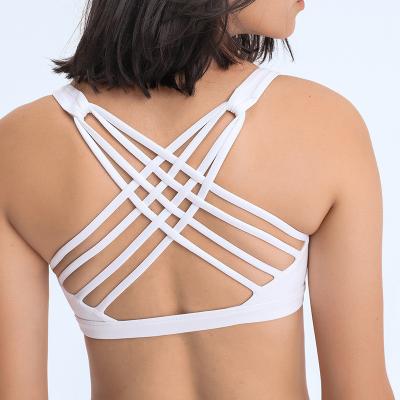 China Naked Feeling Breathable Women Sports Bra Cross Back With Removable Pad for sale