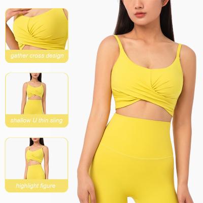 China Bright Color Shallow Front Criss Cross Sports Bra Women Nylon Top With Removable Pads for sale