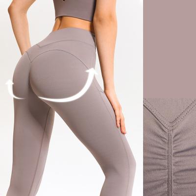 China Elastic Peach Hip Lifting Fitness Yoga Tights Pants Scrunch Butt Leggings Naked Matte for sale