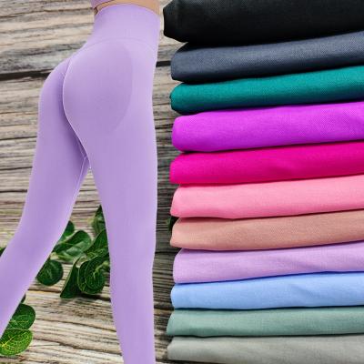 China 11 Colors Hip Lifting Ladies Yoga Pants Seamless Scrunch Butt Leggings Breathable for sale