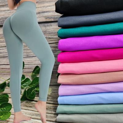 China 11 Color Seamless Women Scrunch Tight Push Up Yoga Pants Gym Fitness Leggings for sale