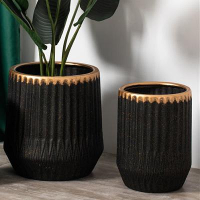 China Customized logo decoration garden succulent plant pots luxury black gold ceramic planter flower pot for sale