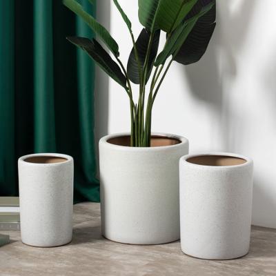China The Latest Design Reliable Hotel Outdoor Corridor Decoration Cylinder Flower Pots White Large Ceramic Pots Planter for sale