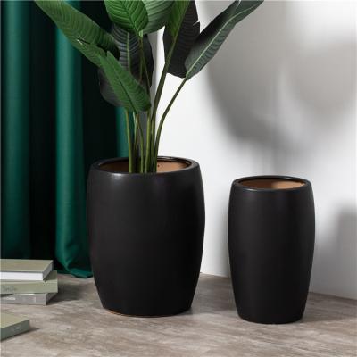 China Hot sale desktop decoration black tall succulent plant pots custom logo ceramic flowerpot for home decor for sale