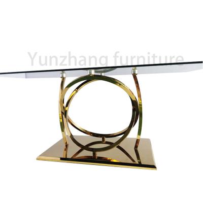 China Yunzoon Furniture Clear Glass Dining Table Mirrored Silver Finish SS 201 Base for sale