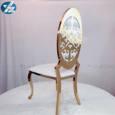 China Ouro da venda direta da fábrica que empilha a cadeira do banquete à venda