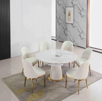 Китай Extendable белый полученный контракт телескопичный обеденный стол конструирует 6 Seater с мраморной верхней частью продается