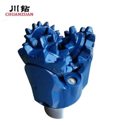 China 9 7/8 avanza lentamente el pedazo tricónico del diente de acero de IADC 127 para el pozo del agua y de petróleo en venta