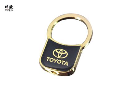 China Empuje los llaveros del coche de Toyota del estilo para los individuos, tenedor del anillo del llavero del acabamiento del oro en venta