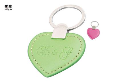 China Tenedor caliente de la llave del cuero del llavero del corazón del amor del logotipo de la prensa personalizado en venta