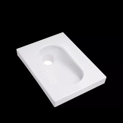 China Anti Leakage Squat Wc Pan Glossy White 6115X425X255 American Squat Toilet Ceramic for sale