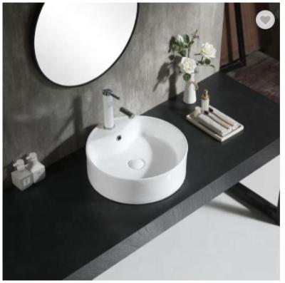 China Diseños modernos del lavabo del lavabo de cerámica de la sobremesa en sala de estar en venta