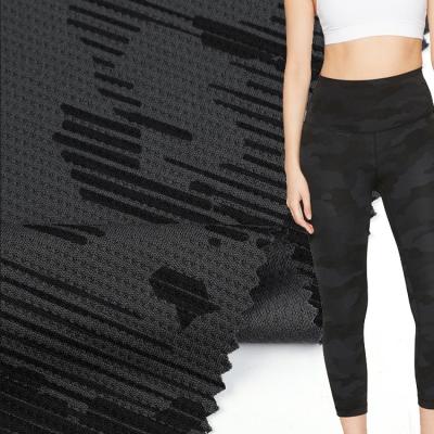 China New Fashion Anti-Static Custom Design Printed 100% Polyester Black Sporty Knitted Mesh Fabric For Sportswear for sale
