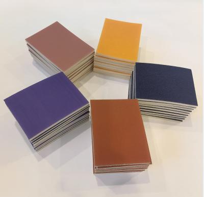 China Almohadilla de esponja de lijado 100x75 mm Esponja de lijado abrasiva Naranja Púrpura marrón rosa en venta