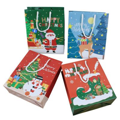 China Merry Xmas Santa White Cardboard Food Packaging Paper Bag 19*9*23cm for sale