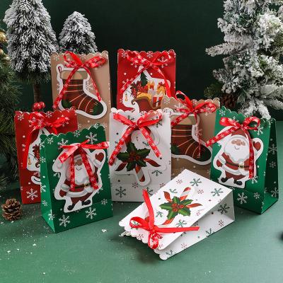 China Ribbon Bow Knot Christmas Printed Paper Bags For Gift Packaging 5g/Pcs for sale