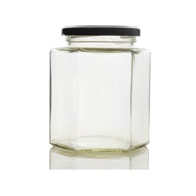 China Hexágono reciclable 380ml Honey Jars de cristal de la categoría alimenticia el 13*13*13cm en venta