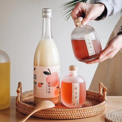 Κίνα Yangmei wine bottle, specialized glass bottle for brewing wine, fruit wine packaging vessel προς πώληση