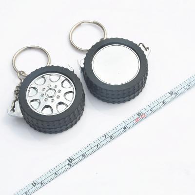 China Reifen-geformtes Gehäuse Mini Steel Tape Measure Keychain Multifunktions zu verkaufen
