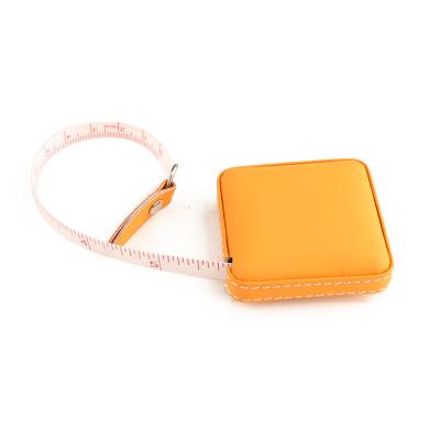 China Wintape Cheapest Centimeter PU leather Tape Measure Sewing 150cm Circular Clothing Bright Orange Color Measuring Tape for sale