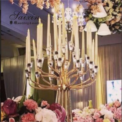 China ZT-440 Hot sell wedding table decoration 25 arms big gold metal candelabra for sale
