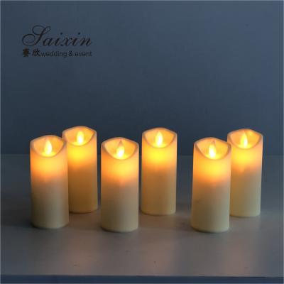China Cheap event decoration plastic battery operated moving flame led  pillar  candles en venta