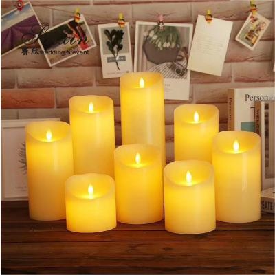 Chine Good quality event decoration real wax dripping dancing flame LED pillar candle à vendre