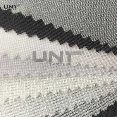 China Full Tricot Warp Knitting Fusible Woven Interlining PA Wet Treatment Enzymes Washing for sale