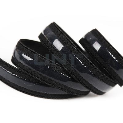 中国 ブラの下着のための1.5cmの幅の黒の伸縮性があるテープ/頑丈な輪ゴム 販売のため