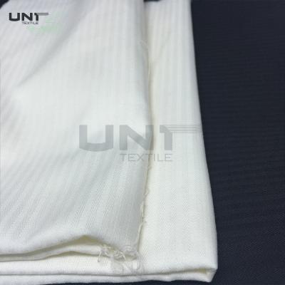 China Tela del bolsillo de la raspa de arenque para los pantalones T/C 65/35 45S 133 x material que interlinea 72 en venta