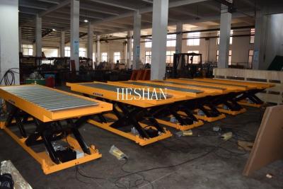 China Transportador de rodillos de mesa elevadora de tijera industrial de capacidad de 4000 lb resistente en venta