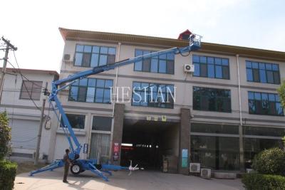 China Towable Articulated Boom Lift Industrial Aerial Cherry Picker 10m 12m 14m 16m 19m for sale