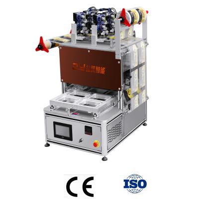 China O nitrogênio 4 bandejas TRAÇA o empacotamento de alimento automático da máquina de Tray Sealer With Date Coding do aferidor do vácuo à venda