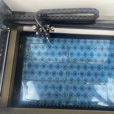 China GSG TPU Leather Screen Protector Laser Cutting Machine Phone Back Skin Design Free Software for sale