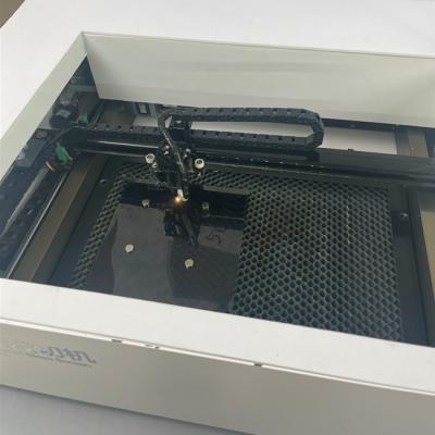 China Máquina de corte de adesivos de tela de vidro temperado móvel 24V personalizada 40 kg à venda