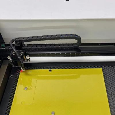 China Daqin C02 Mobile Screen Protector Laser Cutting Machine OEM for sale