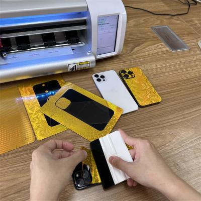 China O ouro 3d do telefone celular gravou a máquina de corte da etiqueta para a loja móvel à venda