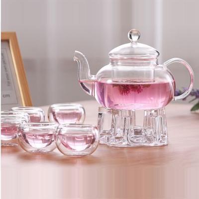 中国 Novolink OEM 8 Set High Borosilicate Glass Teapot 600ml With Tea Light Heating Stand 販売のため