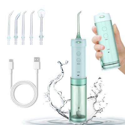 China Irrigador oral Flosser de agua desmontable Dental portátil con chorro de agua limpiador de dientes a prueba de agua 5 boquillas 5 modos UV IPX7 NUEVO en venta